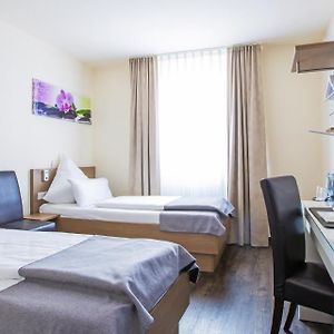 Zimmer mit zwei Einzelbetten
